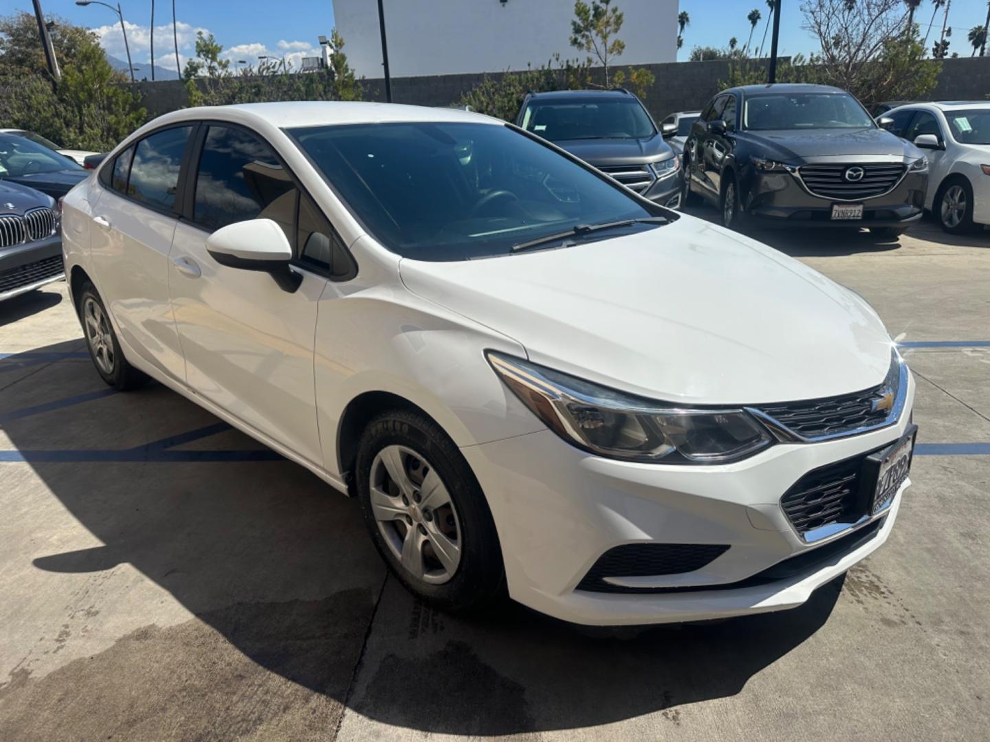 2018 WHITE /Black Chevrolet Cruze Cloth (1G1BC5SM6J7) with an 4Cylinder engine, Automatic transmission, located at 30 S. Berkeley Avenue, Pasadena, CA, 91107, (626) 248-7567, 34.145447, -118.109398 - Photo#6